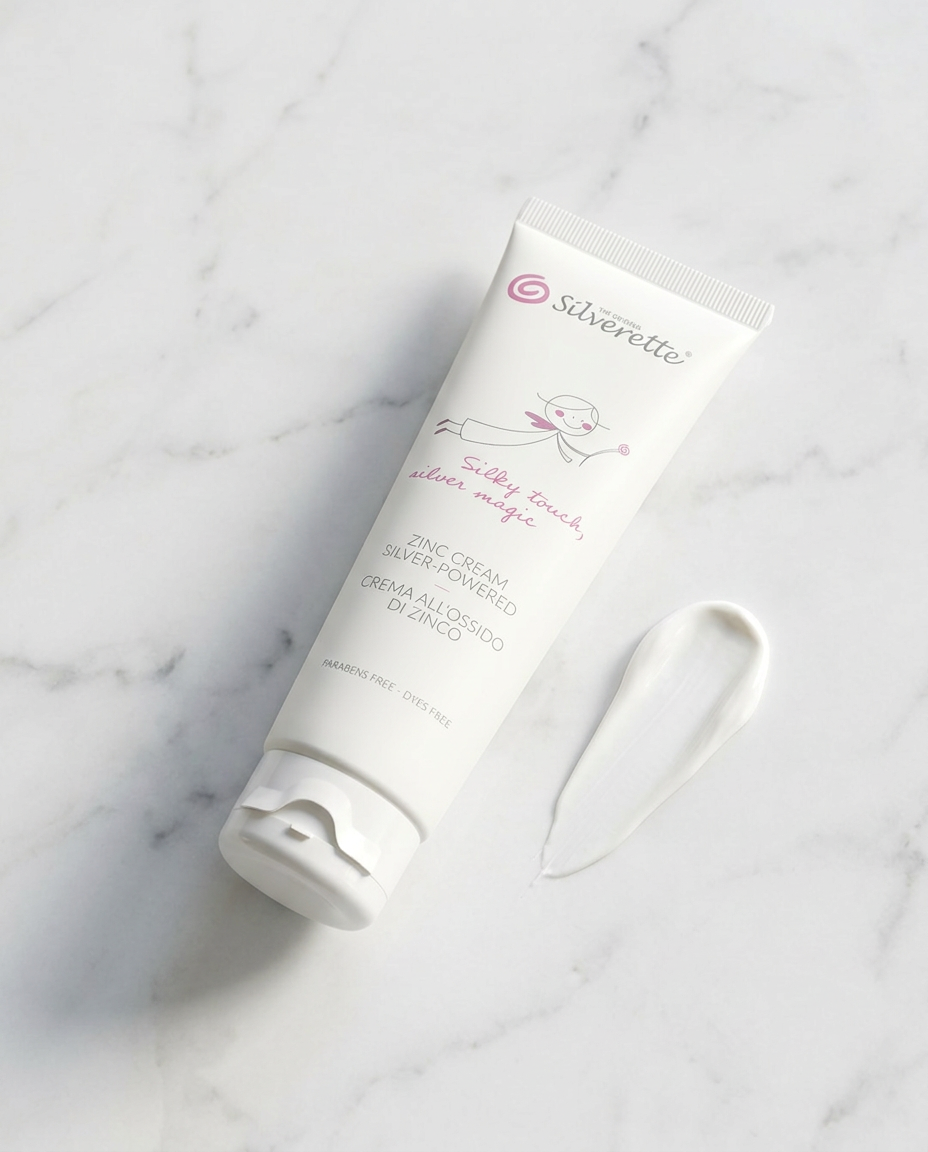 Silverette Zinc Cream 100ml tube beside a swatch of the white cream on marble